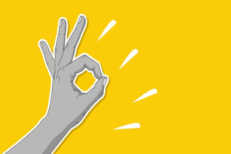 Palec a ukazovák do písmene O, ostatní prsty natažené. Stejný význam jako psané OK má již dávno známé gesto.